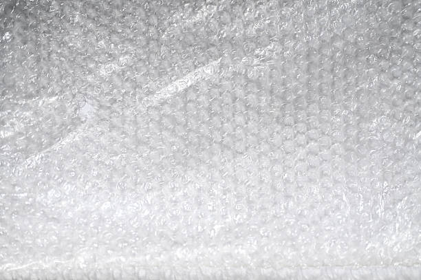 Protecting valuables during shipping with a sheet of air-filled plastic bubbles