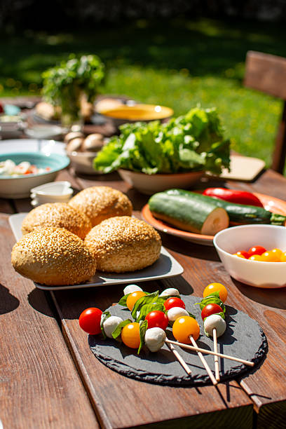 istock Vegetables and mozzarella kebab  served on a picnic table 2235082256