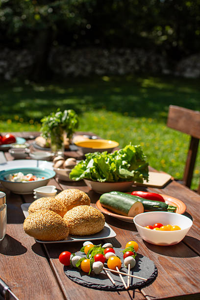 istock Vegetables and mozzarella kebab  served on a picnic table 2235082290