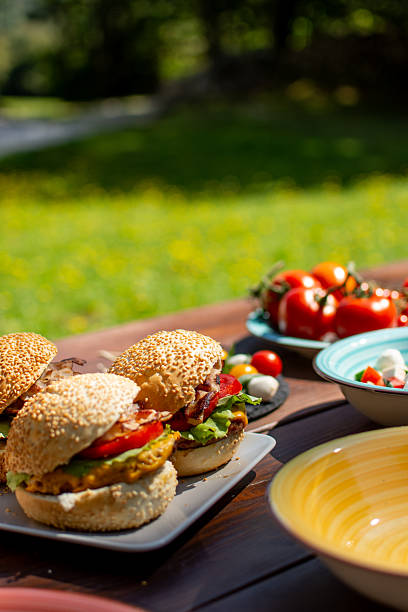 istock Grilled burgers on table served and ready to eat 2235082409