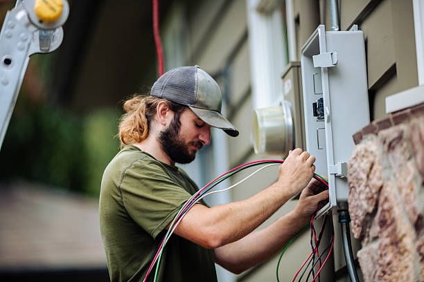 istock Electrician Wiring Up Solar Panel System Fuse Box 2235092402