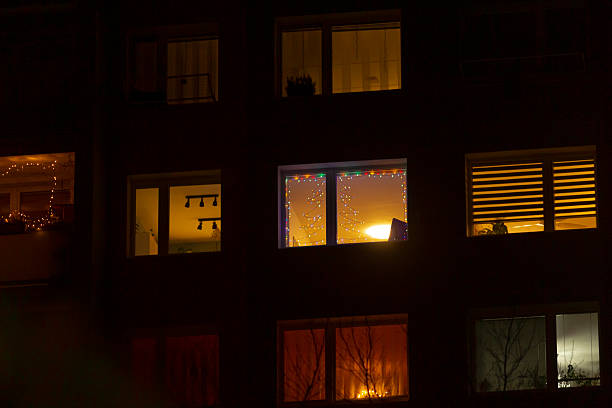 istock Stunning Night Views of Apartment Windows with Beautiful Lighted Decor 2235092669