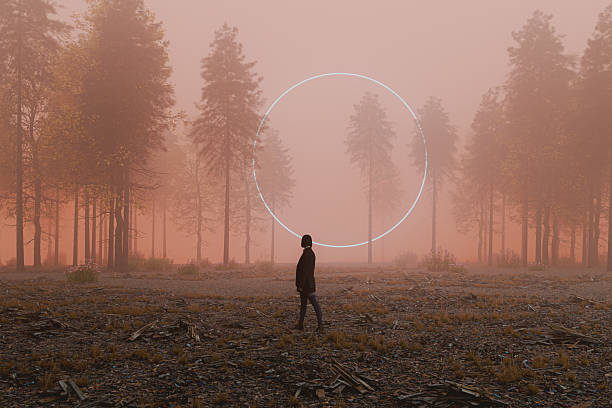istock Young woman standing in mysterious forest 2235094248