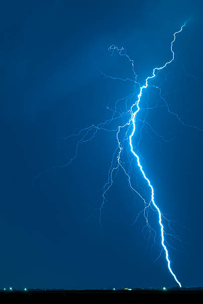 istock Powerful lightning strike illuminating the night sky with electric vibrancy 2235097970