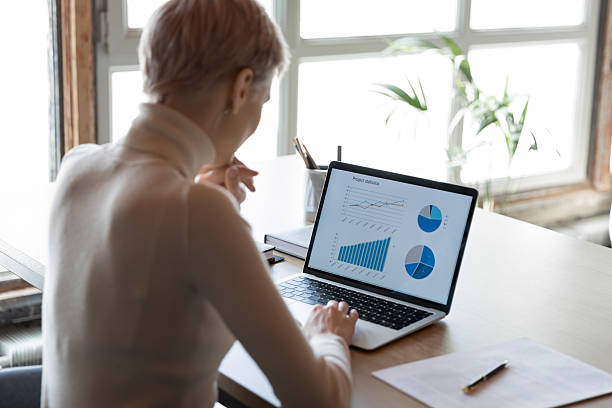 istock Businesswoman, accountant, analyst looking at computer screen 2235101264