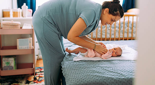 istock Changing my newborn baby 2235106275