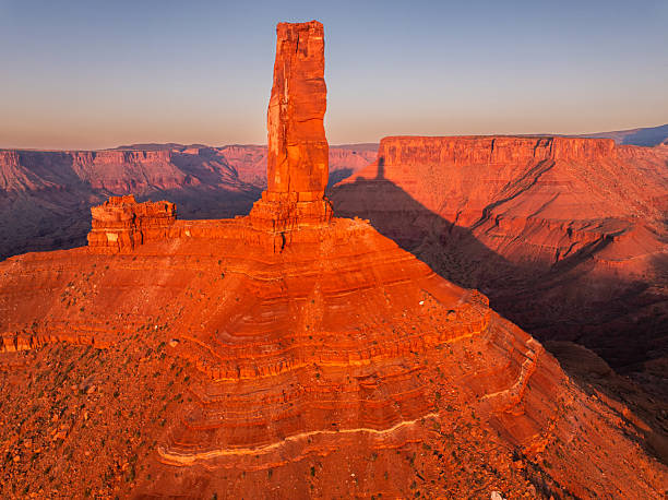 La Sal Mountains with Fisher Towers at Sunset - Scenic view with Colorado River and intense magic light near Castle Valley, Moab Utah USA.