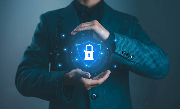 istock Businessman holding digital padlock shield symbol, representing cybersecurity, data protection, online privacy, and secure technology for safe internet communication. 2235118492
