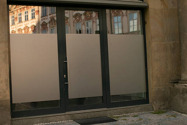 istock A store front featuring a clear reflection of a building in its window 2235119882