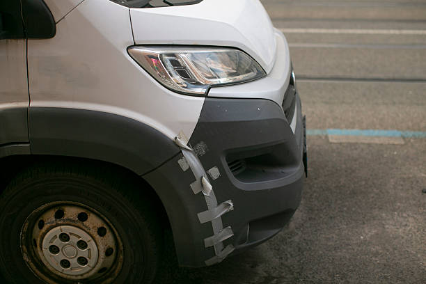 istock A damaged white van is currently parked on the roadside area 2235120002