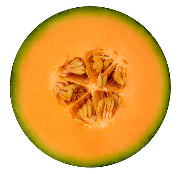 istock Round section of ripe melon with seeds, isolated 2235120850