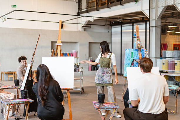 istock Middle Eastern Female Artist Leading Diverse Art Workshop 2235121485