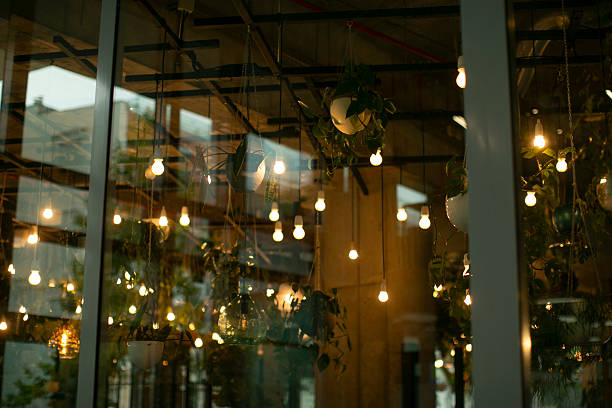 istock A spacious room with numerous lights gracefully hanging from the ceiling 2235121747