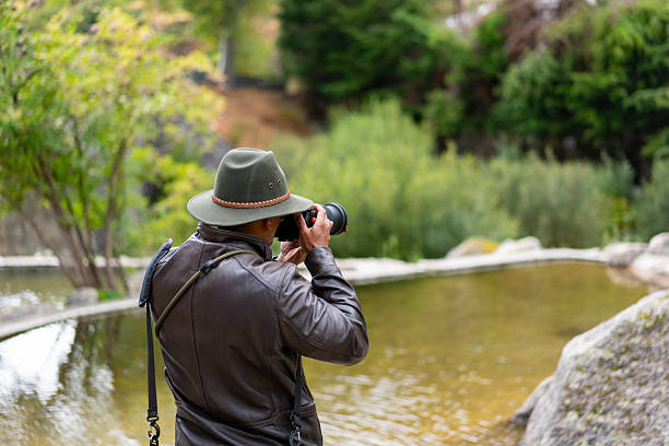 Tourist taking a photo at Loriga River Beach