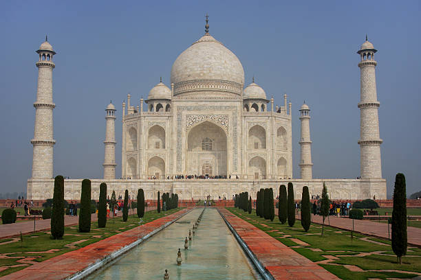 Taj Mahal with reflecting pool in Agra, Uttar Pradesh, India. It was build in 1632 by Emperor Shah Jahan as a memorial for his second wife Mumtaz Mahal.