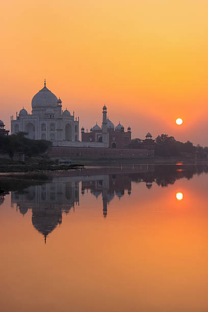istock Taj Mahal reflected in Yamuna river at sunset in Agra, India 2235141676