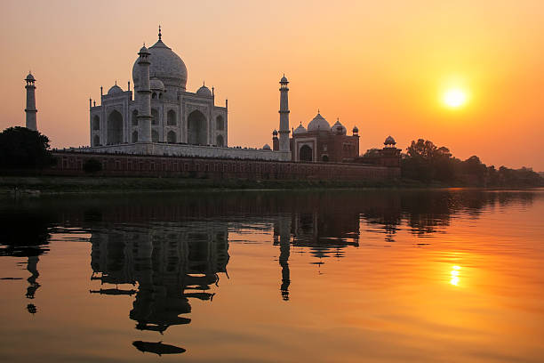 istock Taj Mahal reflected in Yamuna river at sunset in Agra, India 2235142533