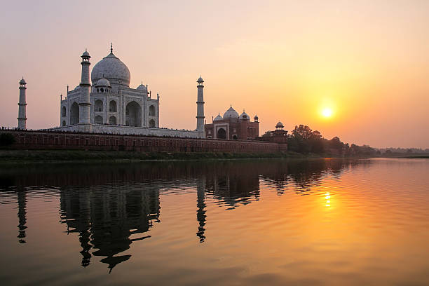 istock Taj Mahal reflected in Yamuna river at sunset in Agra, India 2235142545