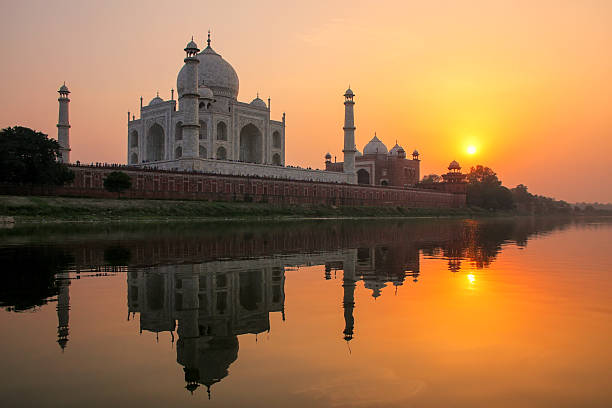 istock Taj Mahal reflected in Yamuna river at sunset in Agra, India 2235142569