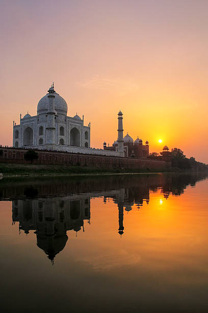 istock Taj Mahal reflected in Yamuna river at sunset in Agra, India 2235142579