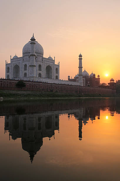 istock Taj Mahal reflected in Yamuna river at sunset in Agra, India 2235142583