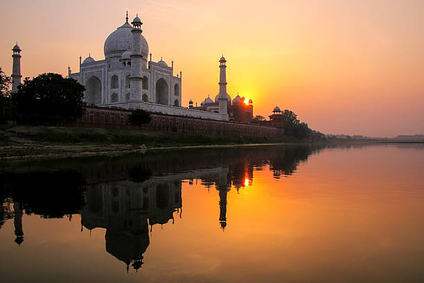 istock Taj Mahal reflected in Yamuna river at sunset in Agra, India 2235142590