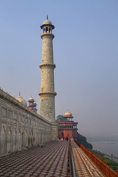 View of Taj Mahal complex facing Yamuna River, Agra, Uttar Pradesh, India. It was commissioned in 1632 by the Mughal emperor Shah Jahan to house the tomb of his favourite wife Mumtaz Mahal.