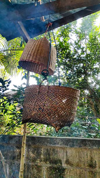 istock Traditional Lanna Bamboo Basket Hanging on Rope 2235143805