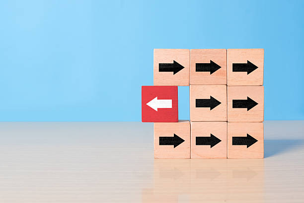 istock stand out think different. individuality and leadership concept 2235143919