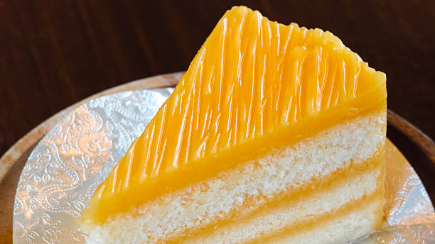 Layer orange cake topped with orange marmalade.