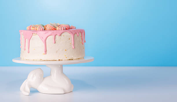 istock A beautifully decorated cake adorned with colorful macarons 2235155565