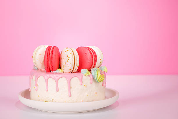 istock A beautifully decorated cake adorned with colorful macarons 2235155580