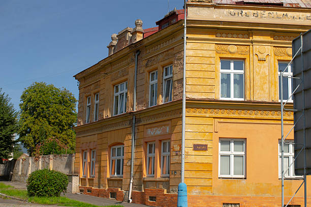 istock Charming Historic Building in Bright Yellow Facade 2235159145