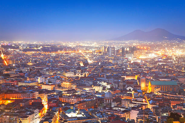 Aerial view of Naples city with Mount Vesuvius by night