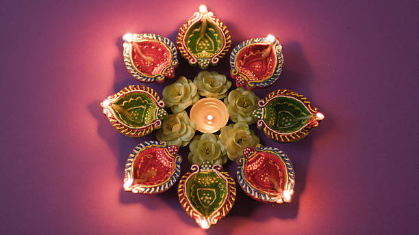 istock Traditional Diwali candles with colorful decorations 2235162770