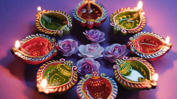 istock Bright Diwali candle flames during celebration night 2235162802