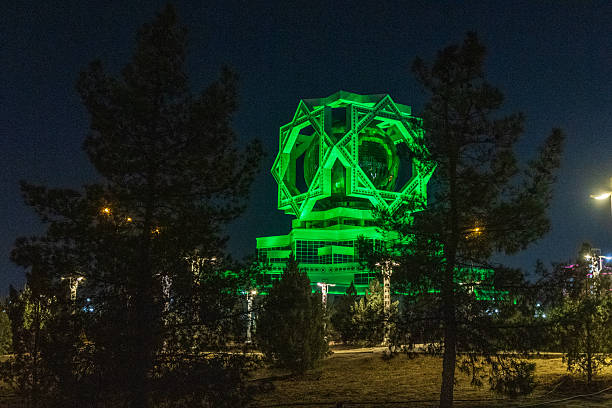 Ashgabat City, Turkmenistan - July 28, 2025. Night time outdoor shot of the Wedding Palace in Ashabat