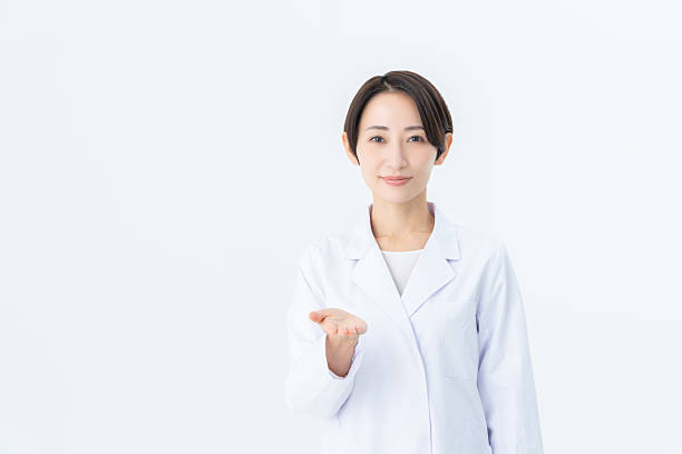 istock Middle-aged Japanese woman in a white coat 2235177536