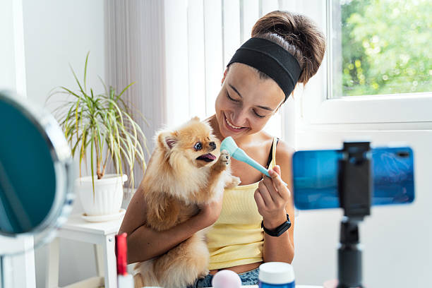 istock Brushing Dog's Teeth with Joyful Smiles 2235177624