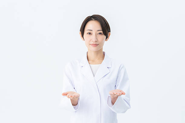 istock Middle-aged Japanese woman in a white coat 2235177758