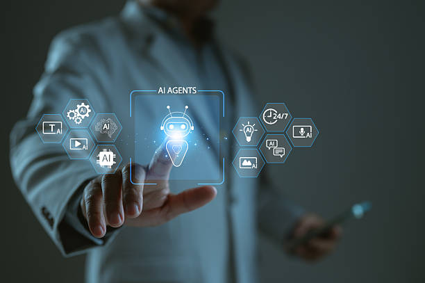 istock Businessman interacts with holographic interface, activating AI agents glowing chatbot icon. Futuristic technology concept represents digital transformation, automation, virtual assistance, 2235180664