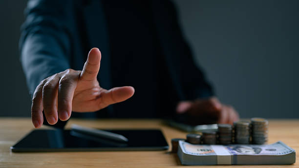 istock Businessman's hand controls virtual interface financial growth, investment success. Wealth management increases savings, profit. Banking technology, digital currency, business transactions generate 2235180793