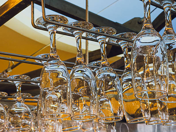 istock Hanging wine glasses in a bar interior 2235180911