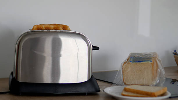 istock A stylish and modern toaster presenting perfectly sliced bread within a chic kitchen space 2235181757