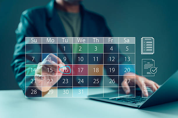 istock Professional marks digital calendar date, planning important business appointments. Virtual schedule management using modern technology, ensuring efficient task organization deadline tracking. Person 2235182253