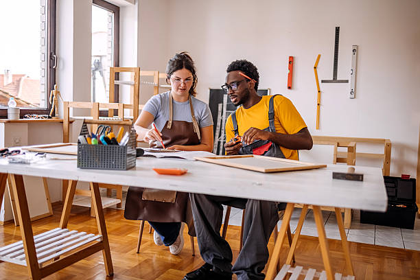 istock Young people starting small business working in carpentry workshop 2235185914