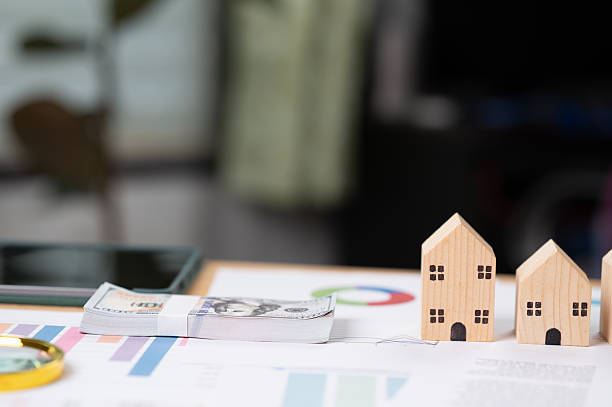 istock Professional Analysis Financial Documents Real Estate Savings, Us Dollar Bills House Models Desk, Emphasizing Financial Wellbeing Estate Planning 2235196886