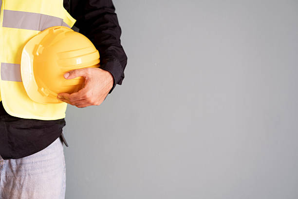 istock Studio portrait of a young male architect/construction worker 2235197075