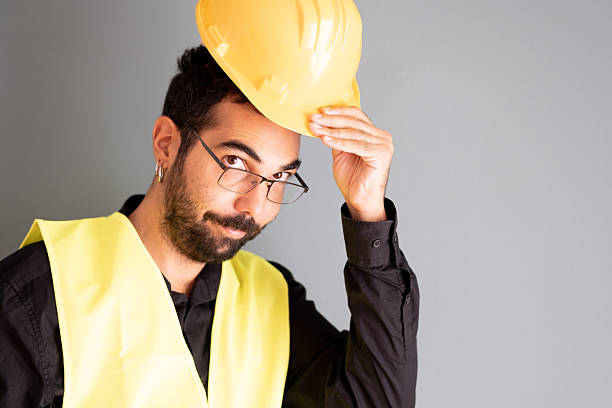istock Studio portrait of a young male architect/construction worker 2235197237