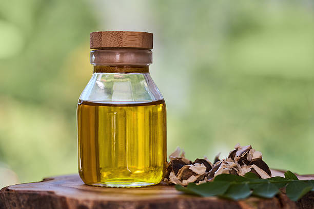 istock Natural Moringa Oil and Leaves 2235197587